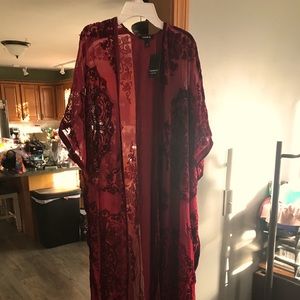 Beautiful sheer cover with velvet accents